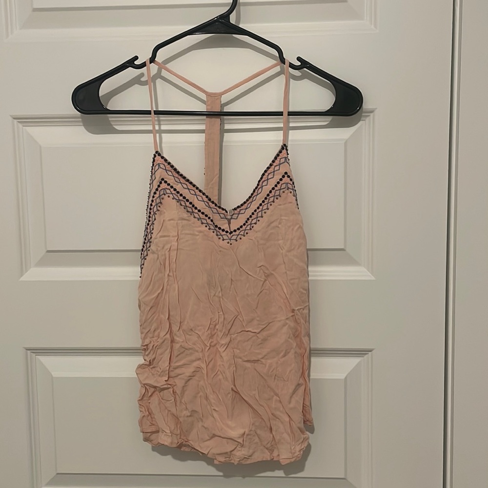Light pink open back tank top with beaded detail
